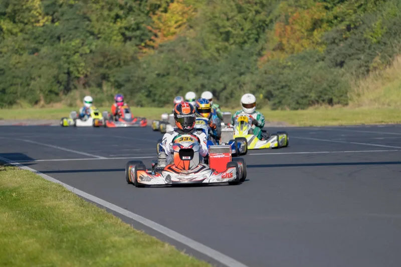 Karting field led by the EKS kart · Photo: Helle Dahl