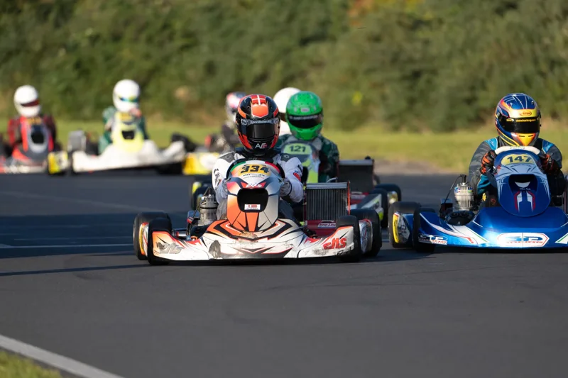 EKS kart alongside a competitor · Photo: Helle Dahl