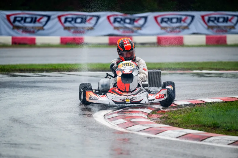 EKS kart at the kerb in wet conditions