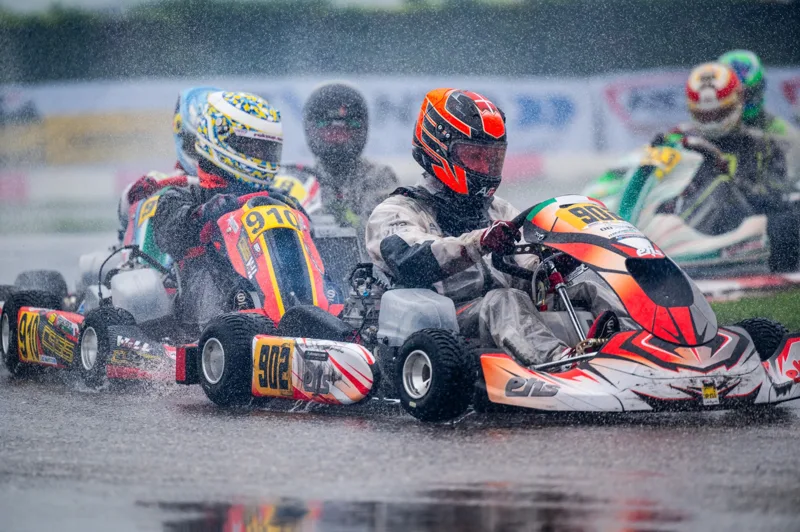 Close kart racing in the rain