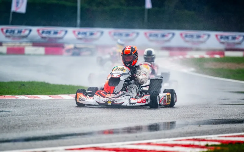 EKS kart through a wet corner
