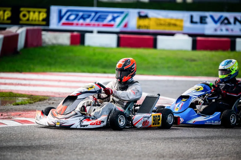 Two karts side by side at the kerb
